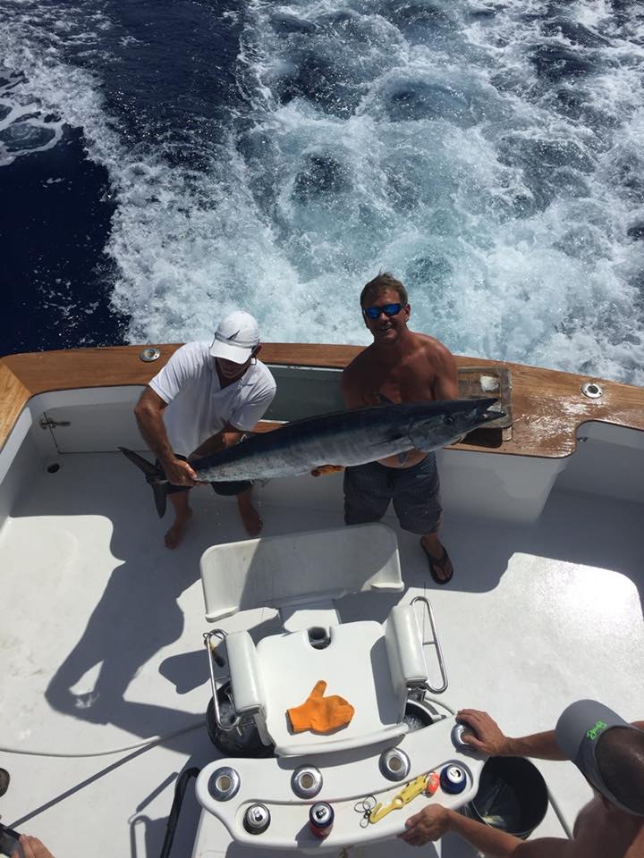 A fisherman catches a 33-inch fish in Nags Head