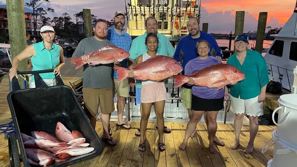 3 large fish caught by a group of 8 people in Orange Beach