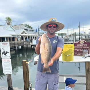 A person fishing in FL