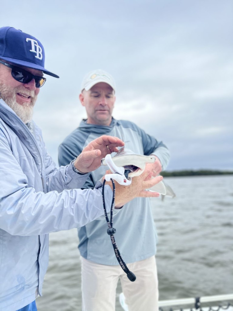Two anglers enjoying a day of fishing in Florida
