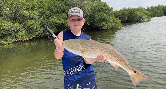 Angler with big 27-inch fish in FL