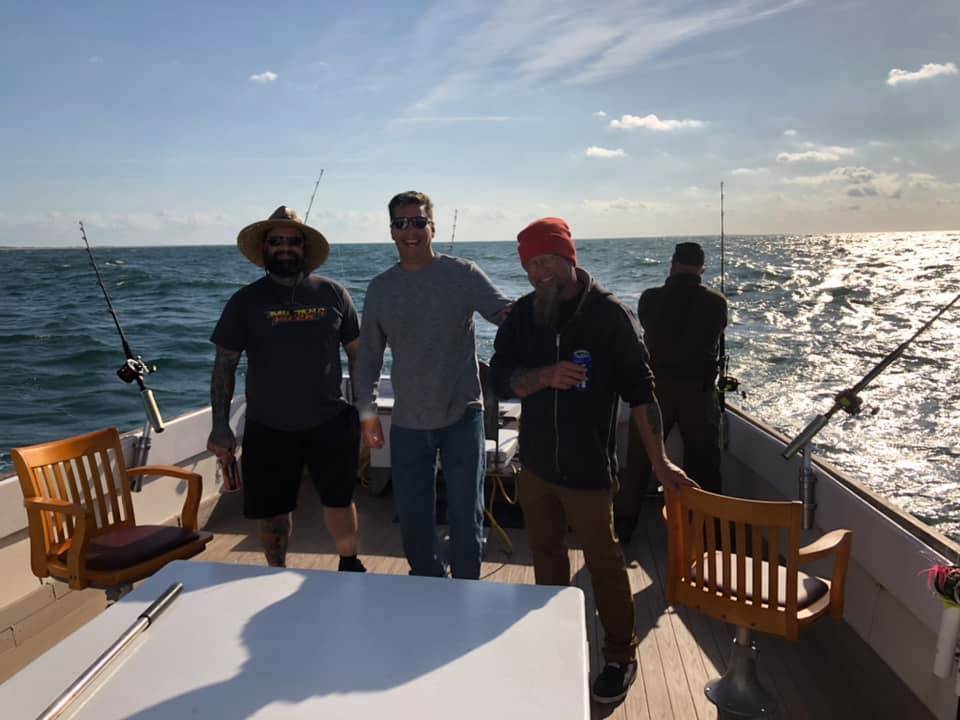 Three people enjoying outdoor recreation in Morehead City