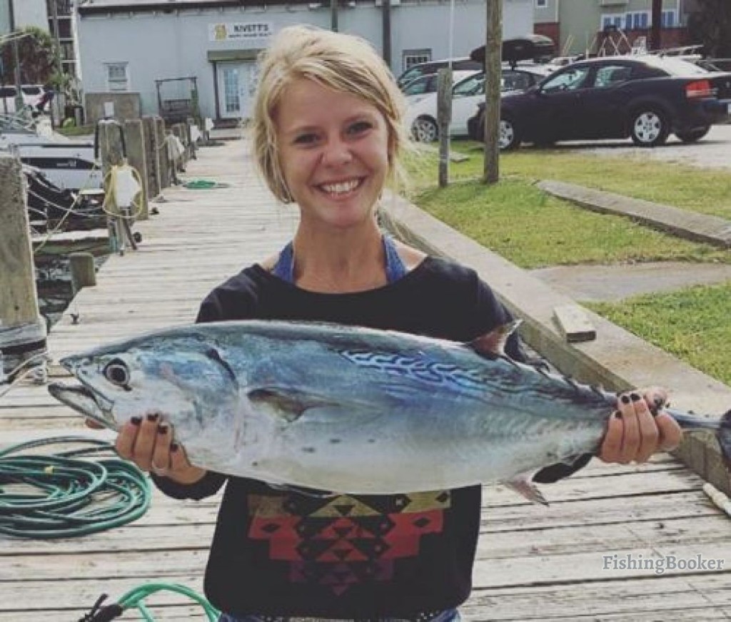 Fisherman with a 21-inch catch in Morehead City