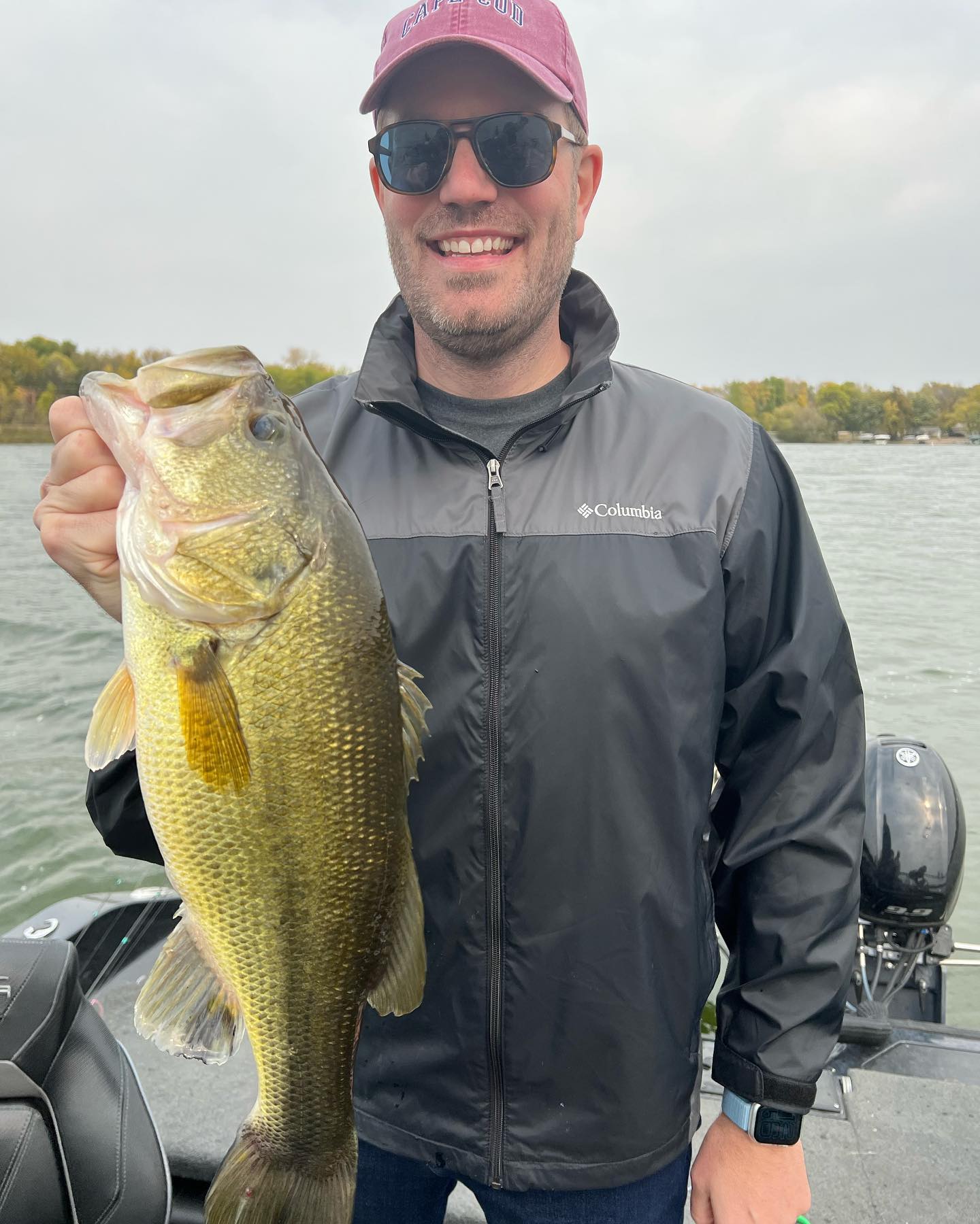 A person fishing in Minnesota, holding a fishing rod