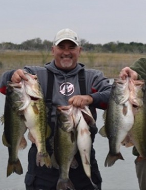 A person fishing in TX with 5 caught fish