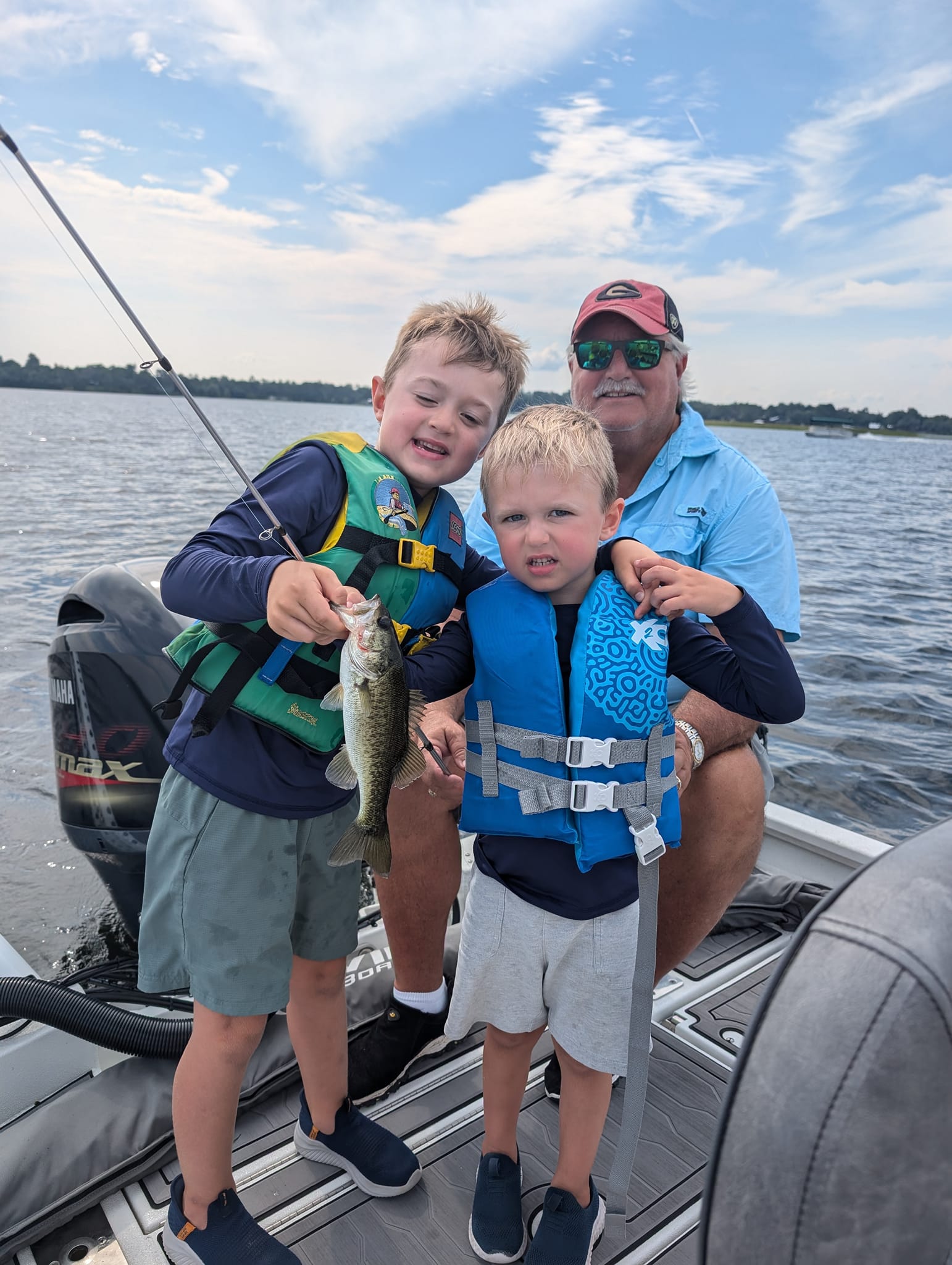 Three people fishing for Florida bass in Palm Bay