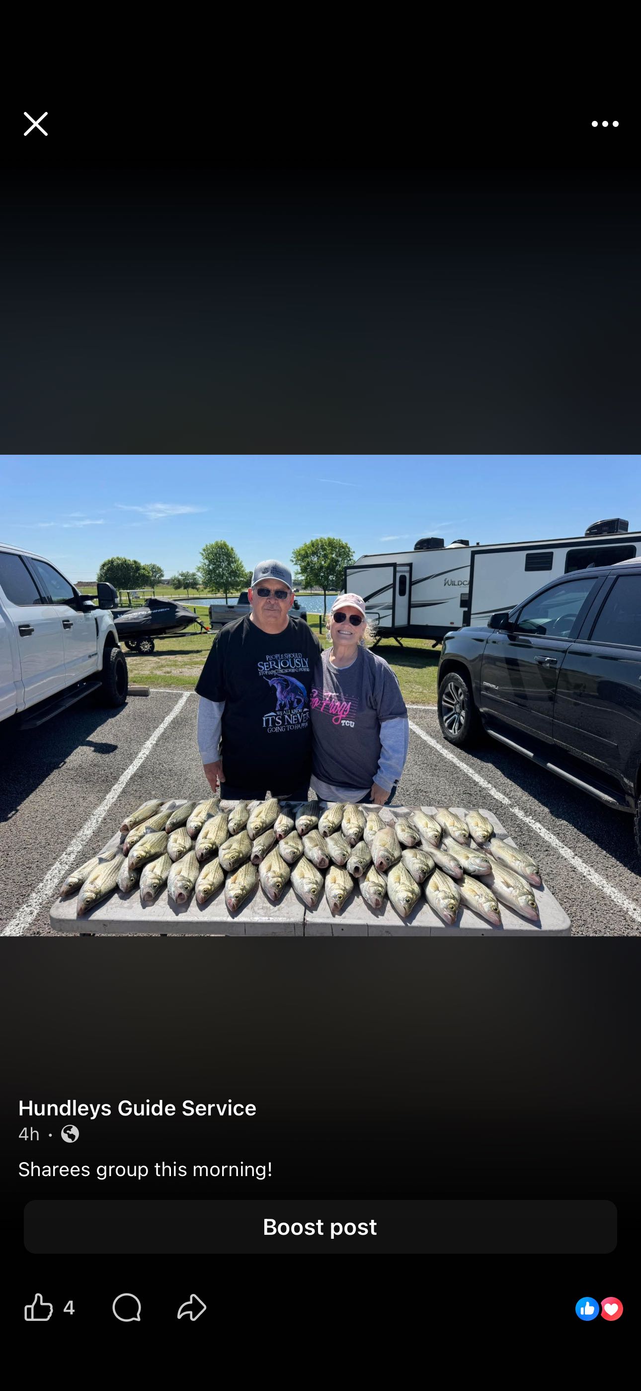 Large catch of fish displayed on pavement at Cleburne TX fishing location