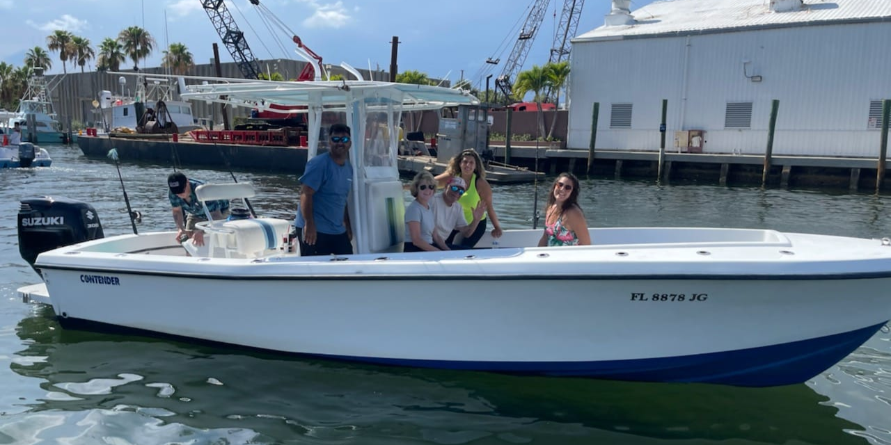 4 people fishing at Pompano Beach