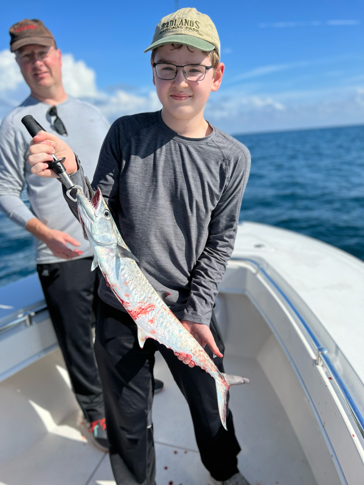 Two anglers with a big fish catch in Florida