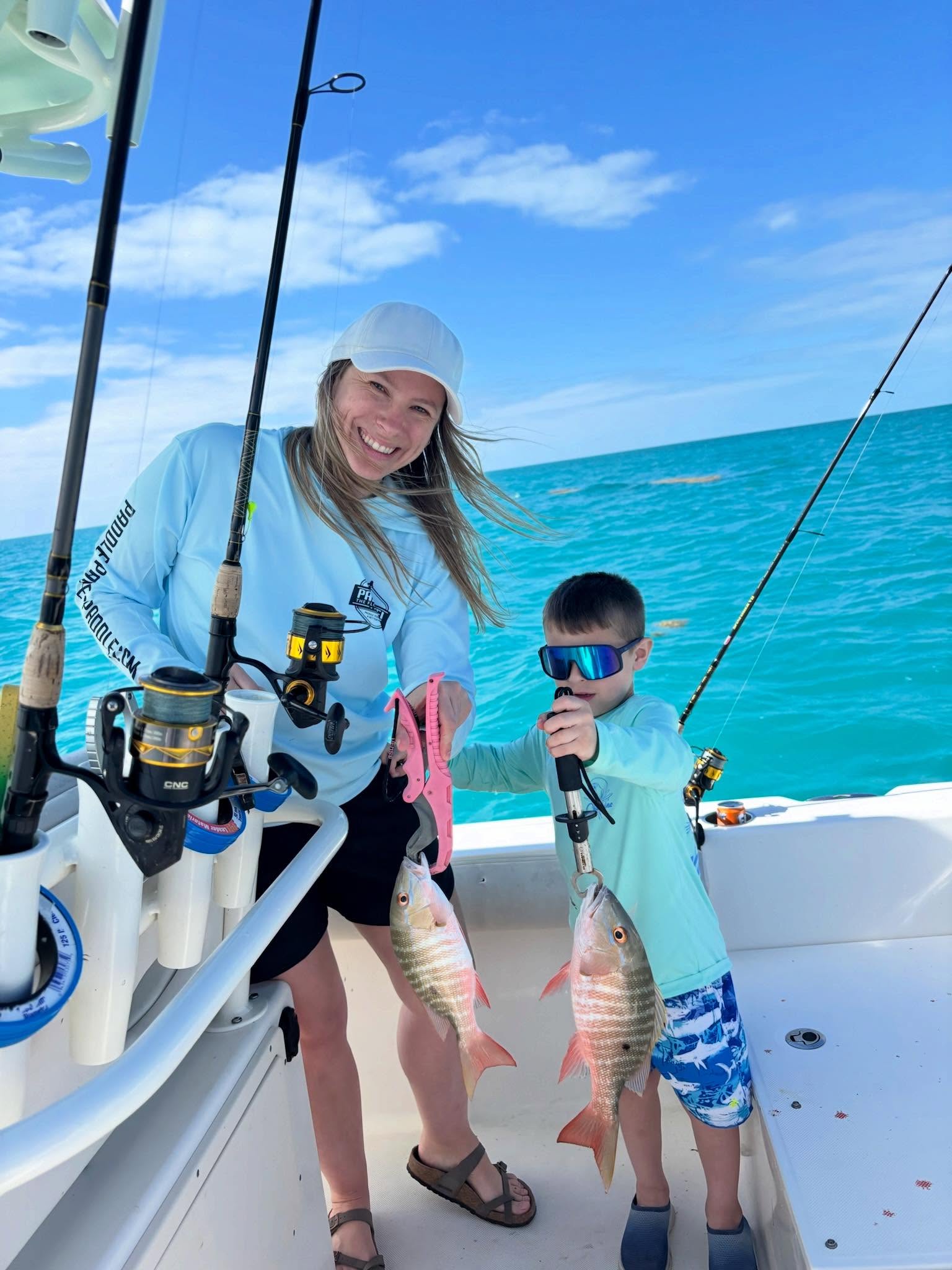 Fishing success with mutton snapper catch on charter boat in Key Largo FL waters