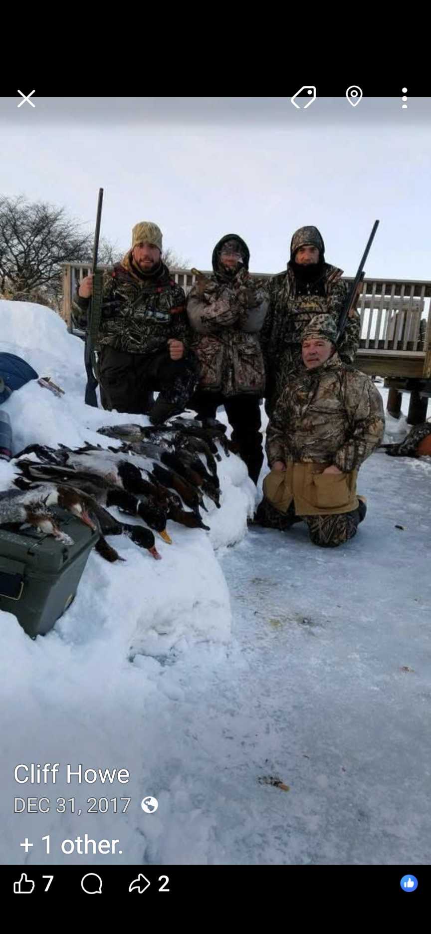 Duck hunting success with harvested waterfowl laid out on snowy ground in Detroit MI