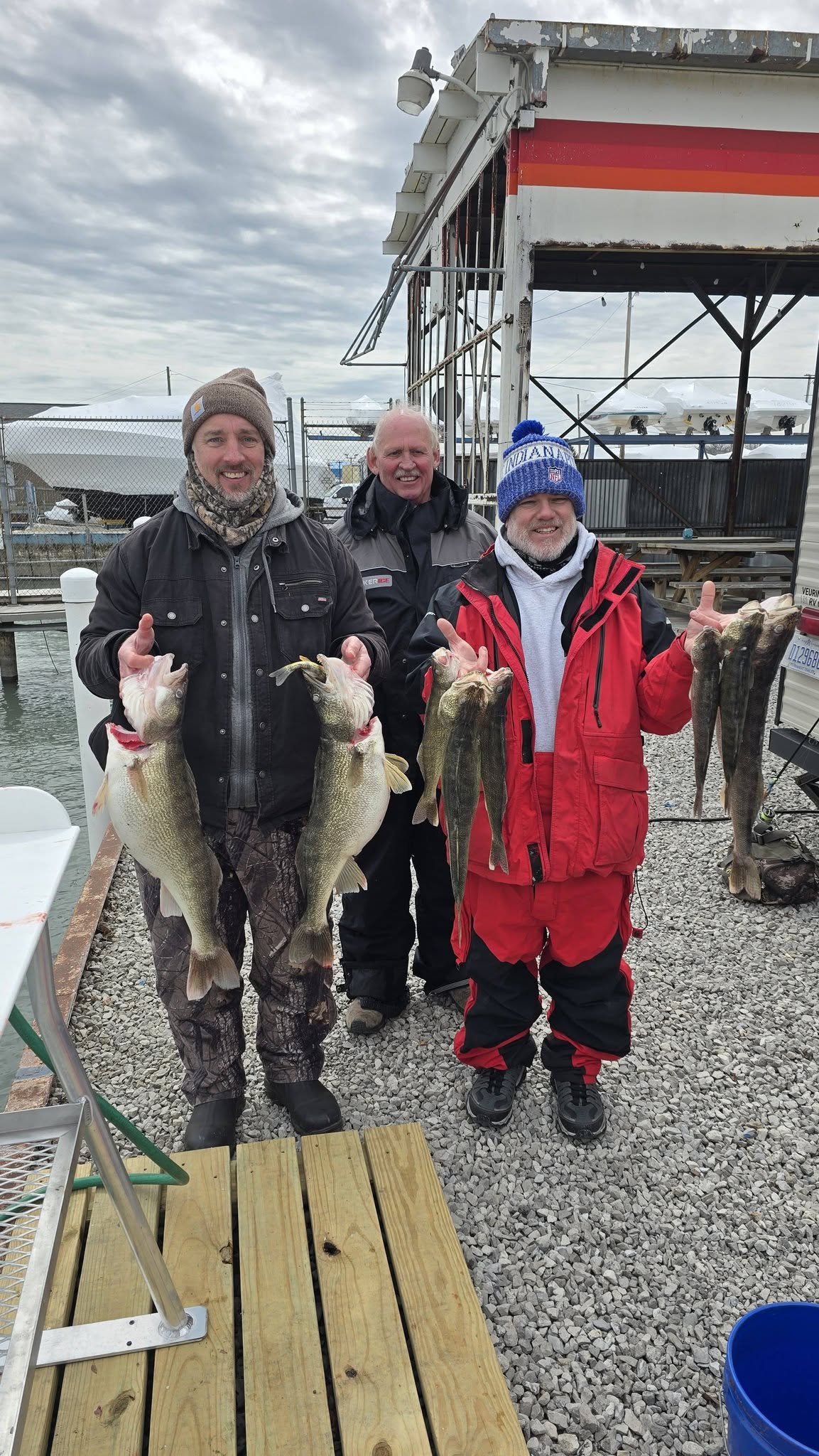 Successful walleye fishing trip in Whitehall MI with fresh caught fish displayed