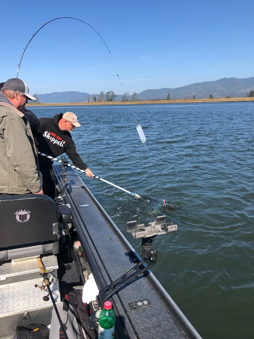 Two people fishing on the coast of Oregon