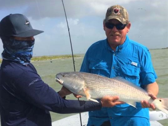 Photograph of a large redfish caught in Corpus Christi