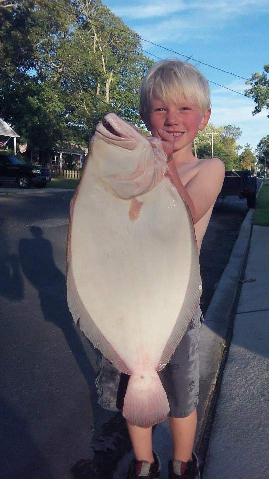 Angler holding a 25-inch fish in NJ