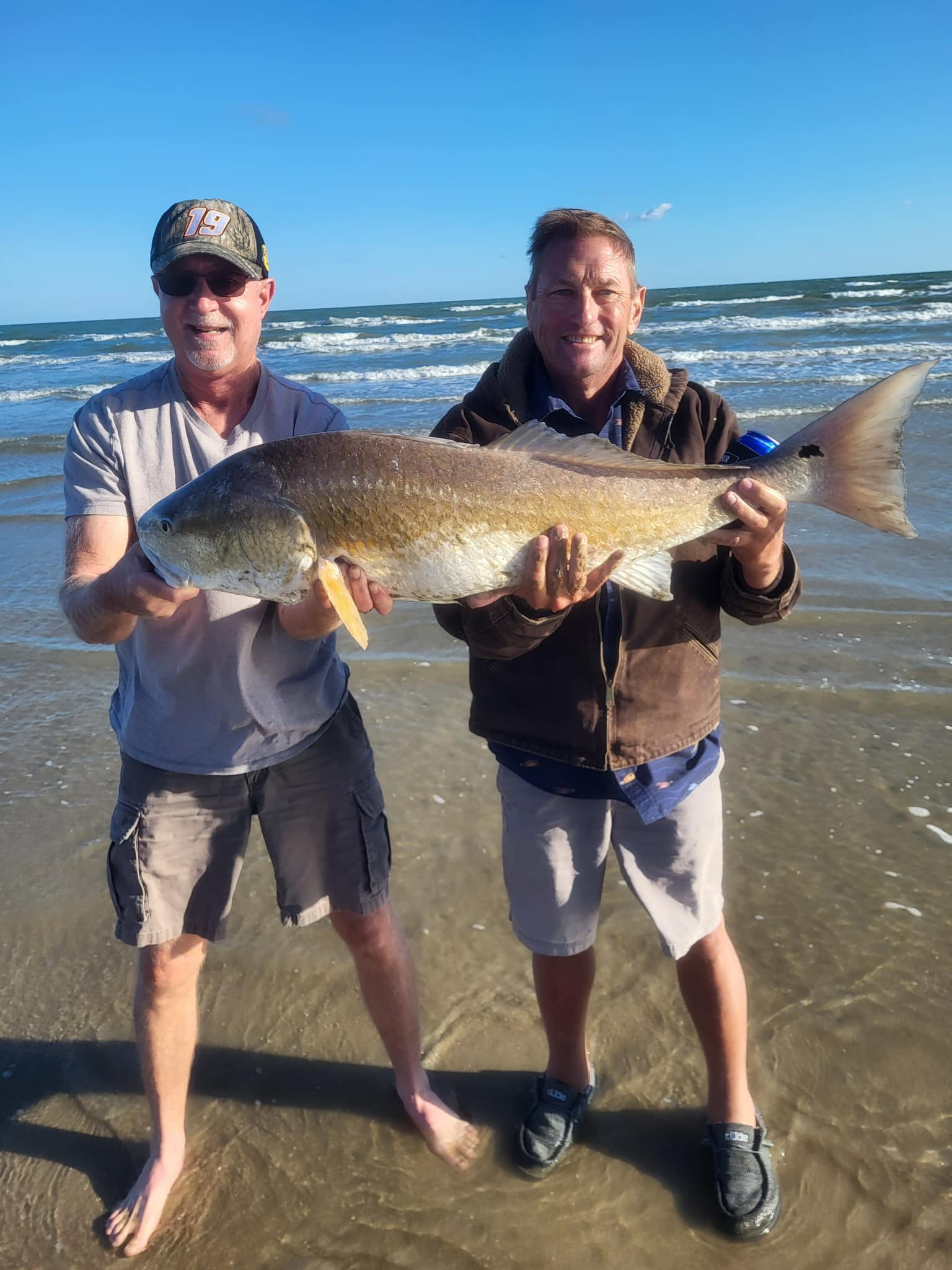 Two people fishing in TX