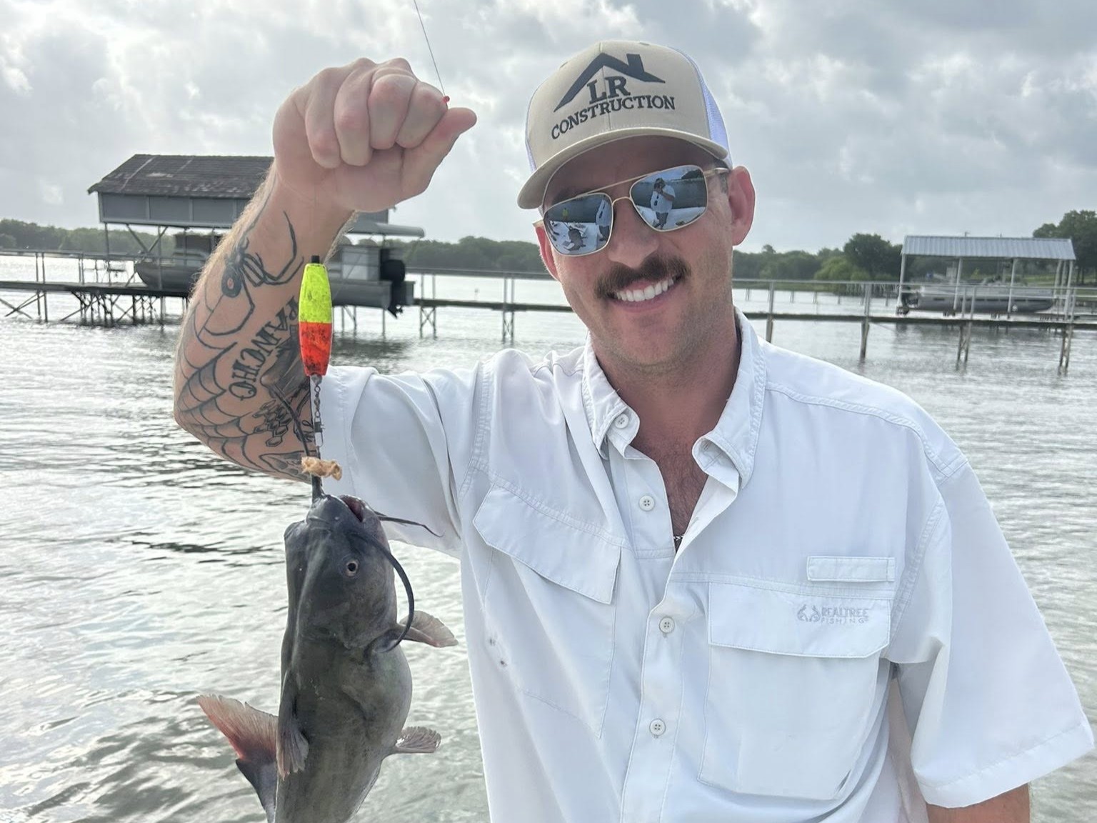 Lake Tawakoni fishing boat with Guide Brett Kilmer targeting catfish, striped bass in Quinlan TX