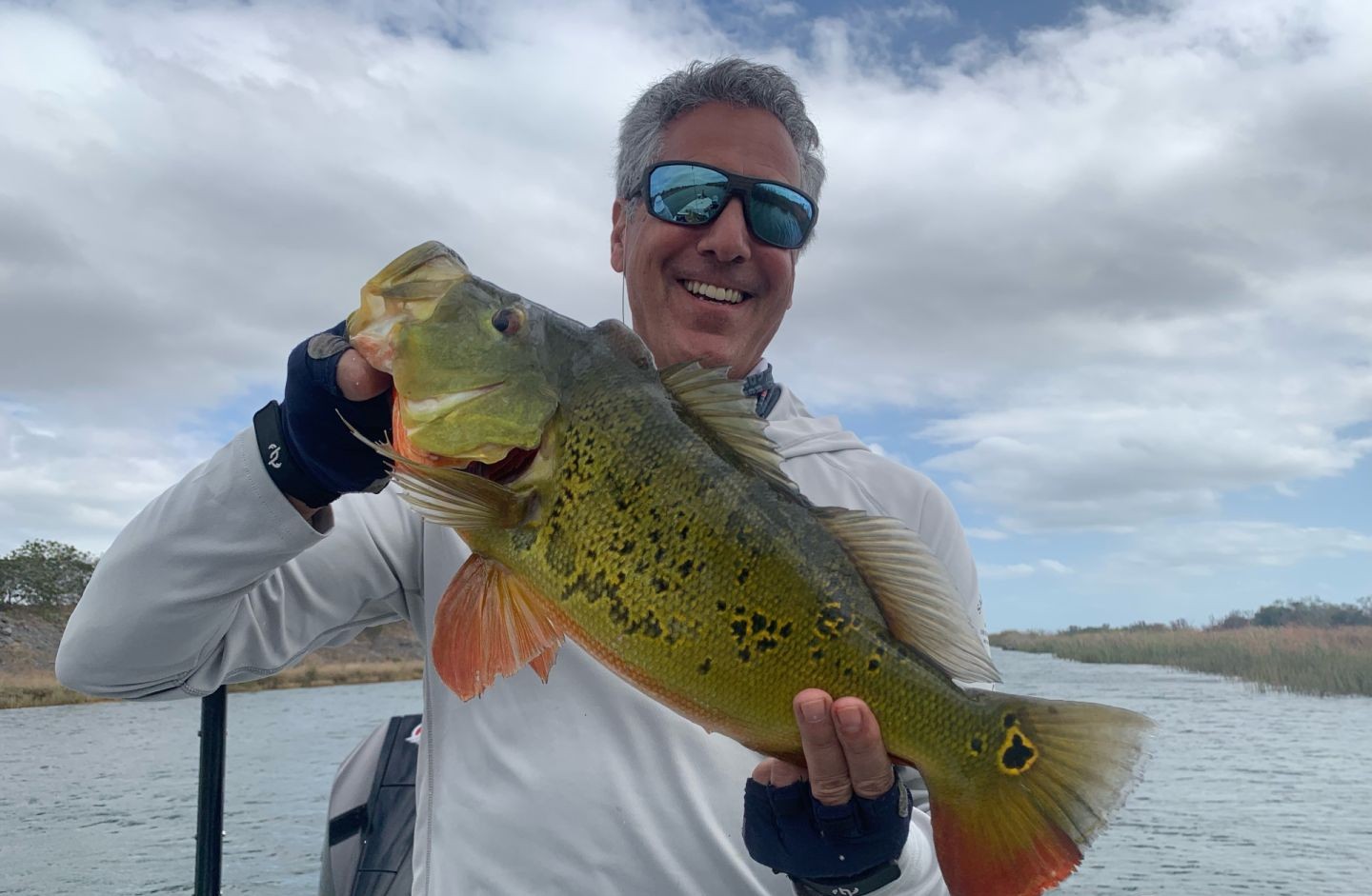 Peacock bass caught while fishing in Palmetto Bay FL