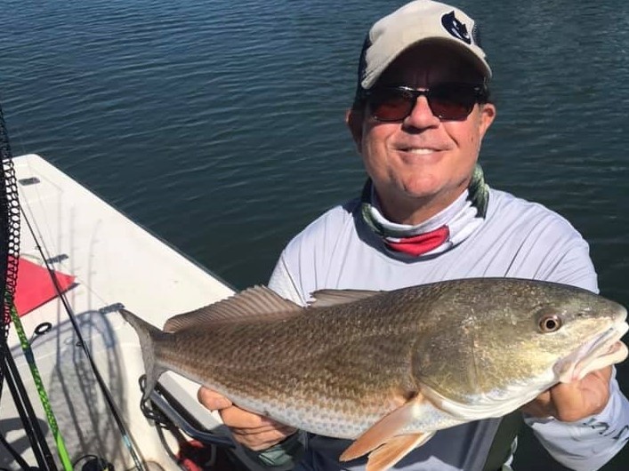 The World Famous Rad Reeling w/a solid  redfish