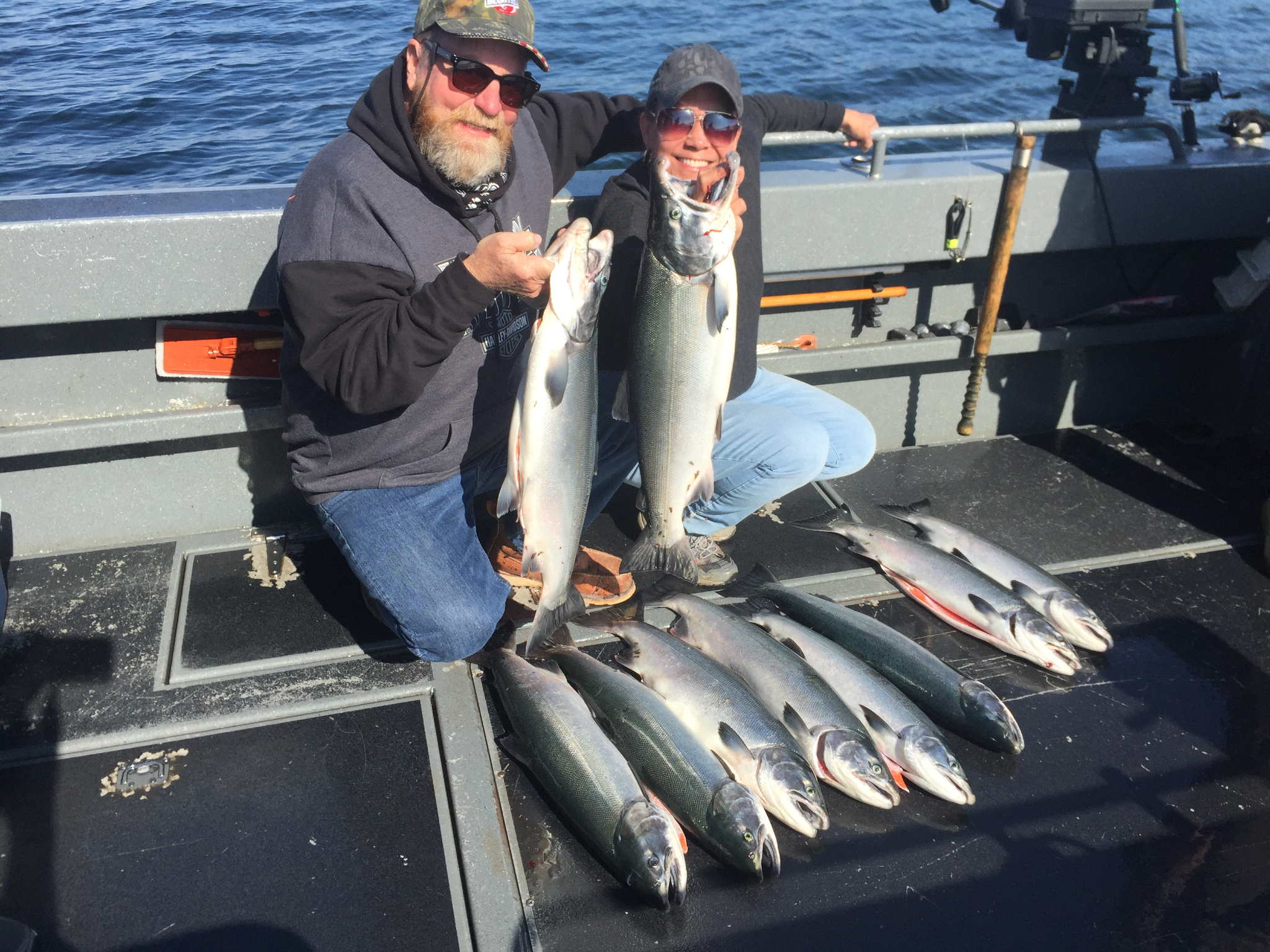 Successful coho salmon fishing charter in Juneau Alaska with multiple fish caught