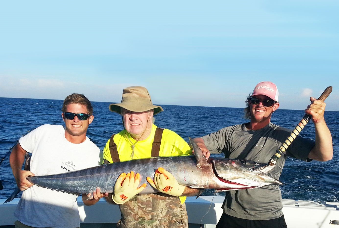 Three people fishing at Destin