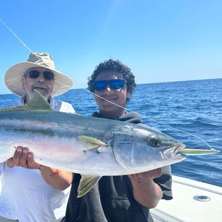 Two anglers with a big 24-inch fish caught in CA
