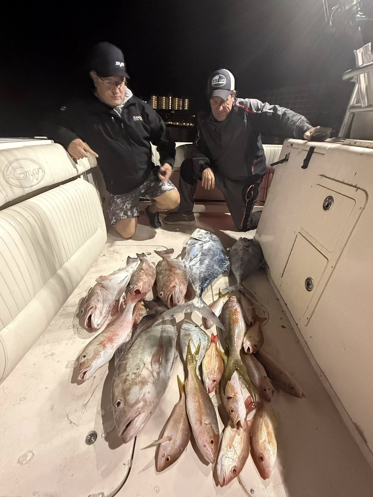 Two anglers fishing with rods in Cape Coral