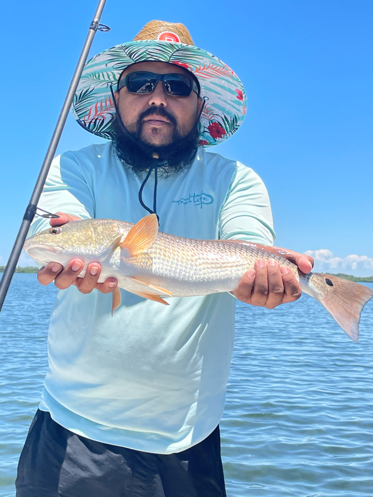 A lone angler enjoying a holiday fishing trip