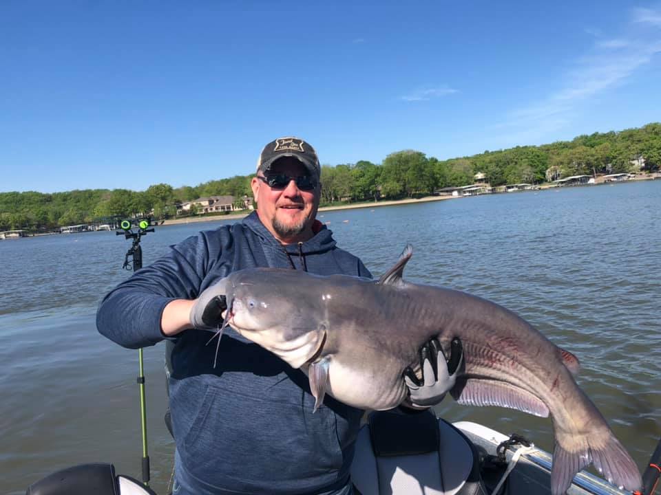 Angler with a big blue catfish caught in MO