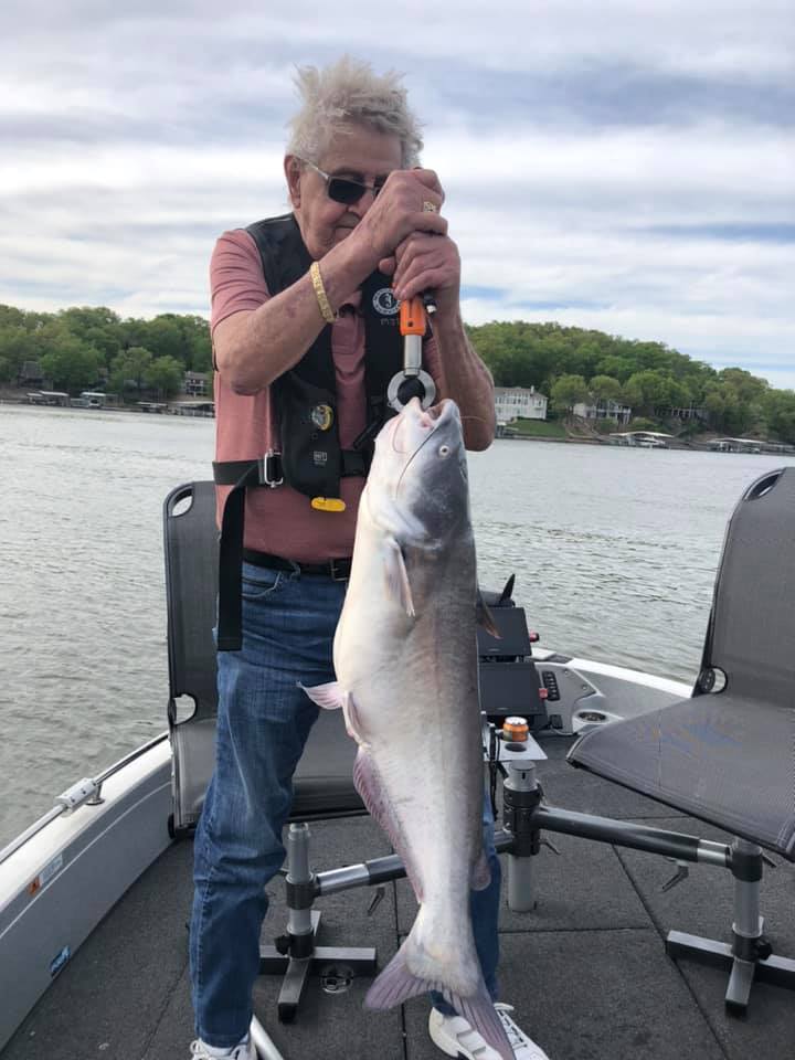 Angler with a big blue catfish caught in Eldon