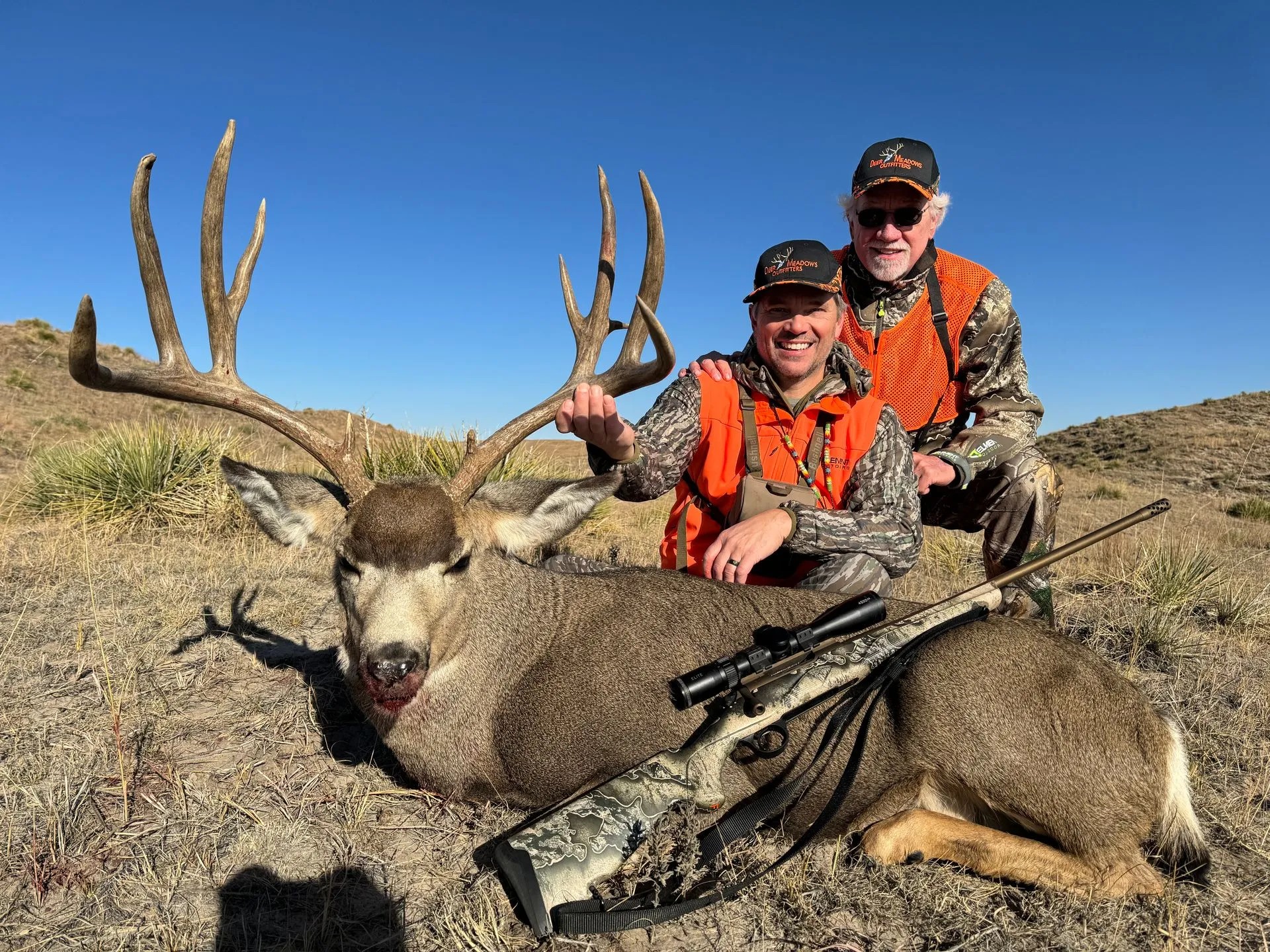 Two hunters with a big 32-inch fish in the NE