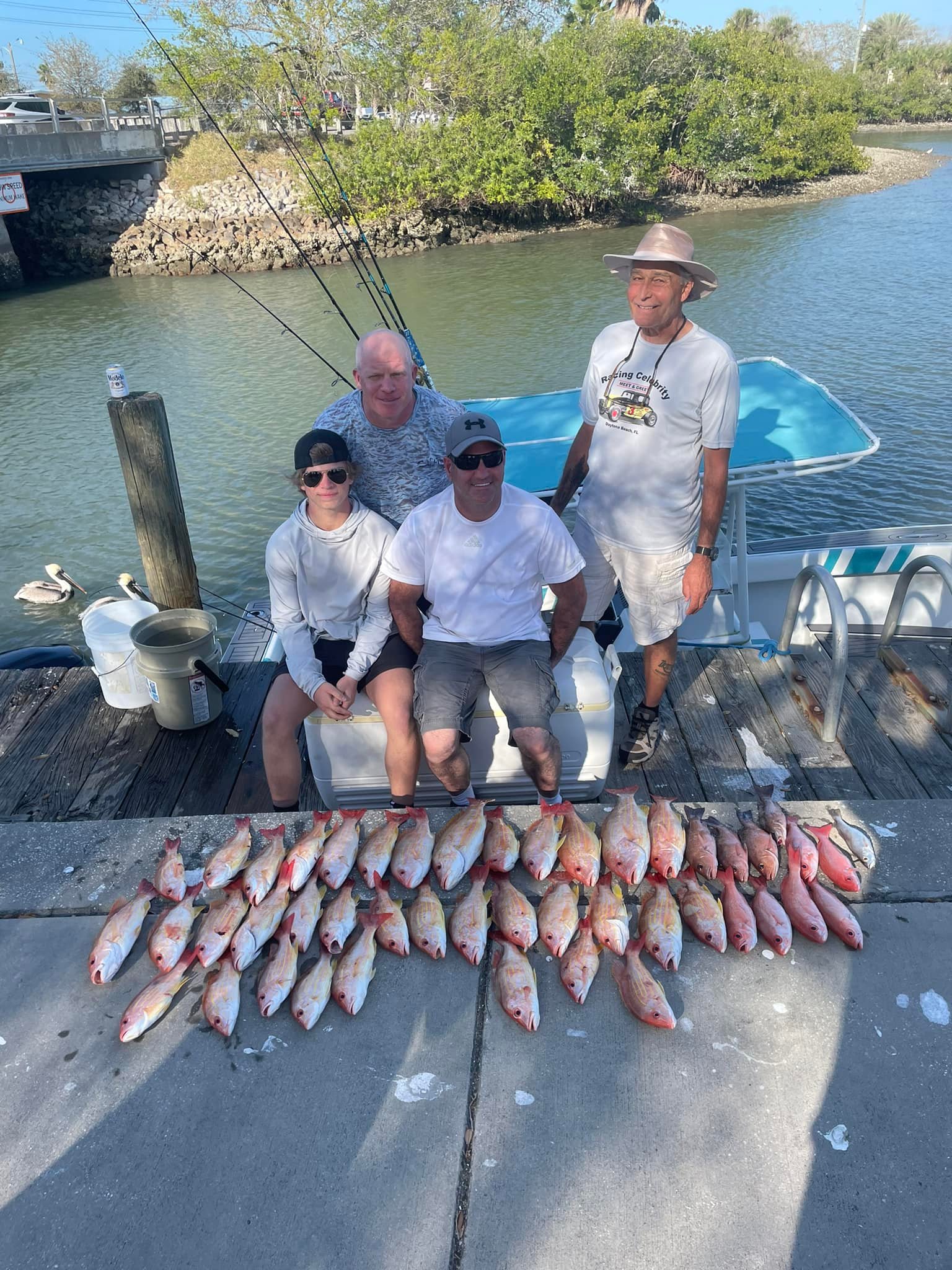 Group of 4 people fishing at New Smyrna Beach