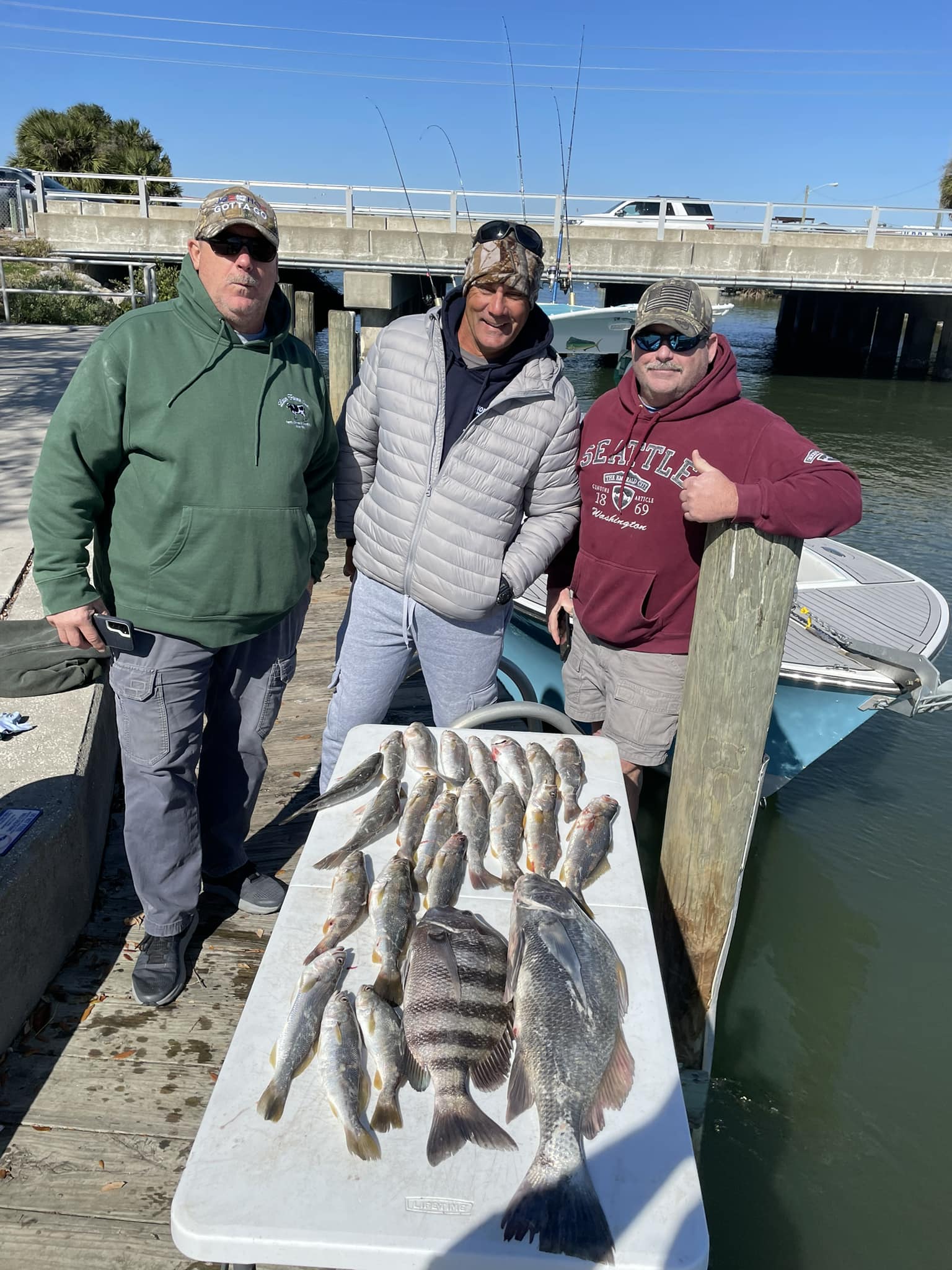 Three people fishing at New Smyrna Beach
