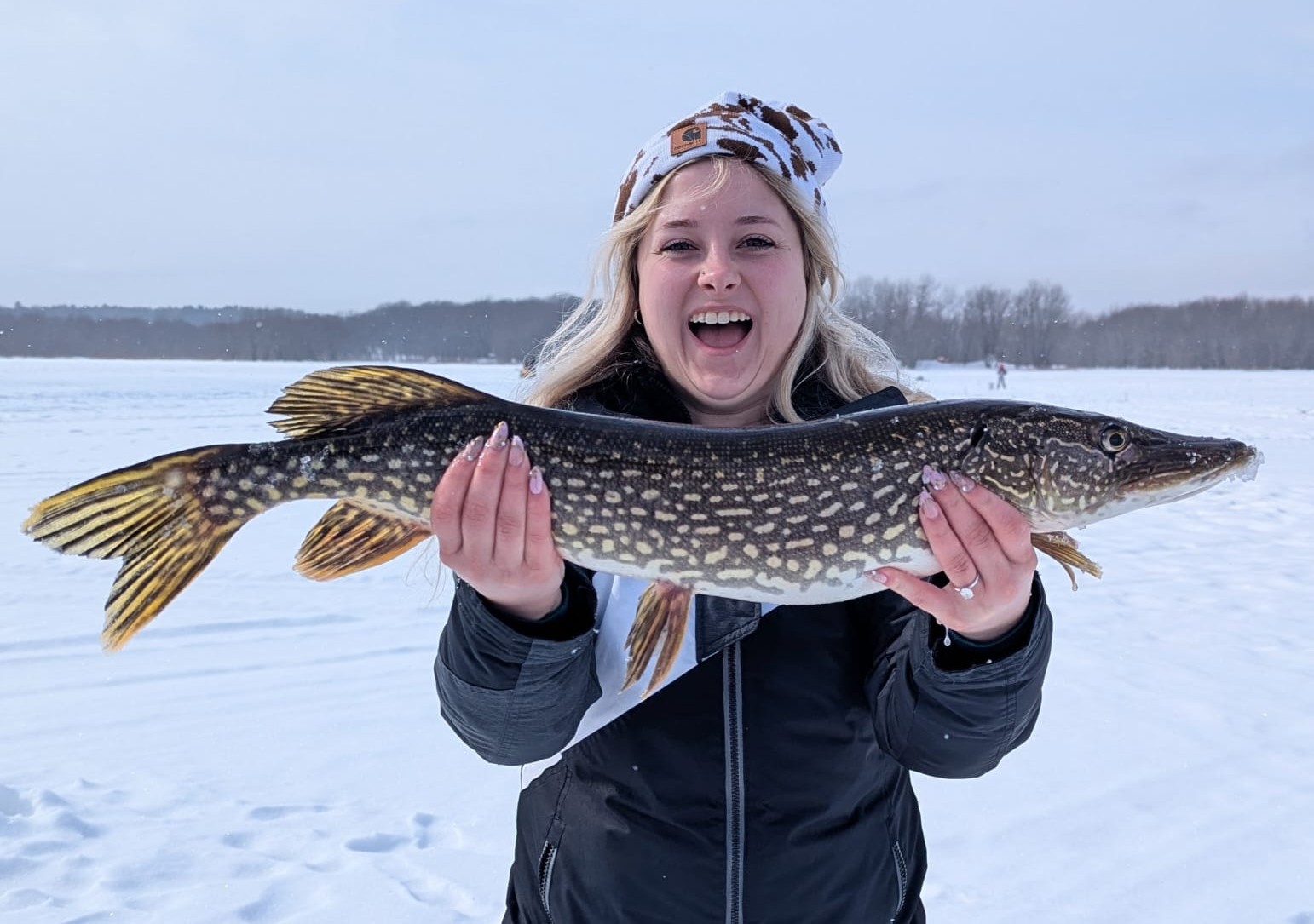 Ice fishing sale on frozen lake - discounted end of season fishing trips