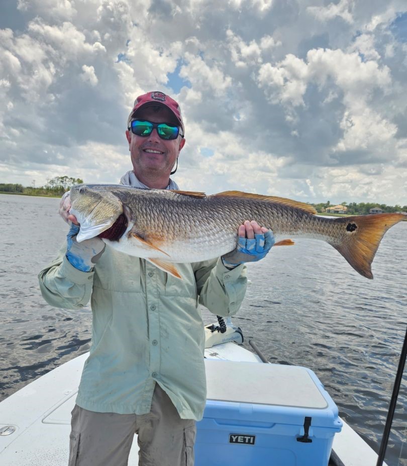 Large redfish caught during fishing trip in Jacksonville Florida waters