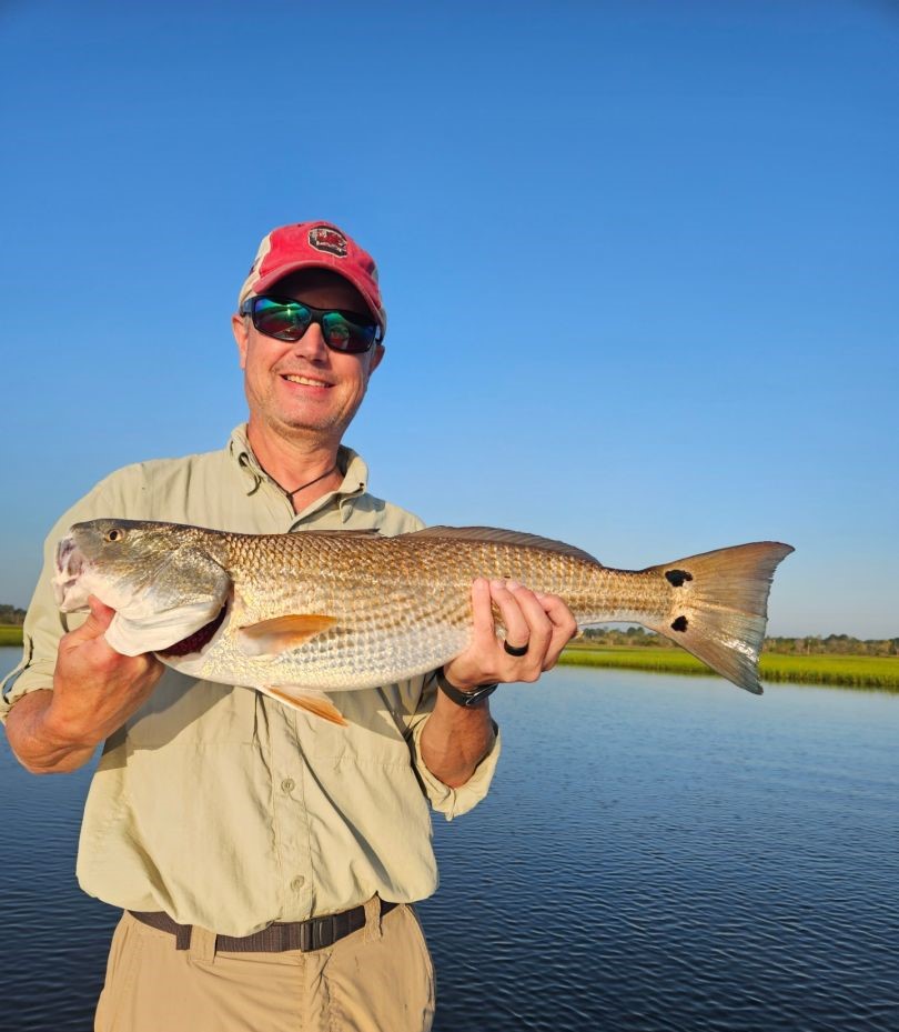 Redfish catch displayed in Jacksonville FL fishing waters