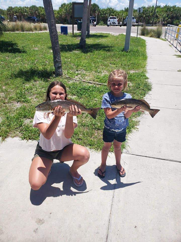 Two redfish, 19 inches long, caught fishing in Lakeland