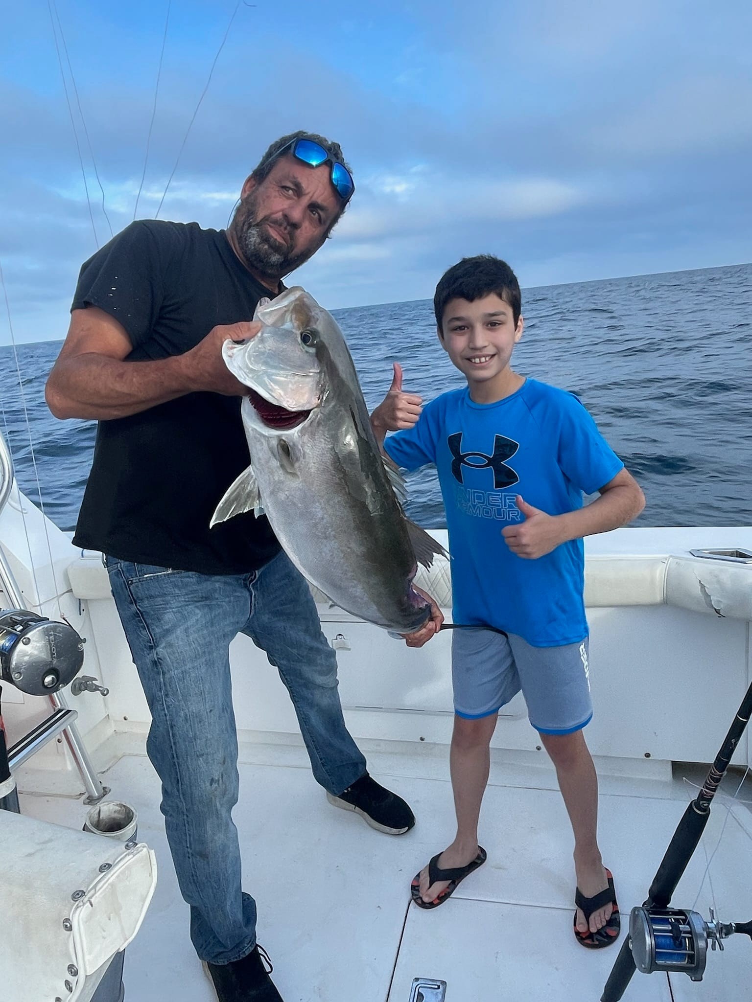Two anglers with a fish caught in Tierra Verde