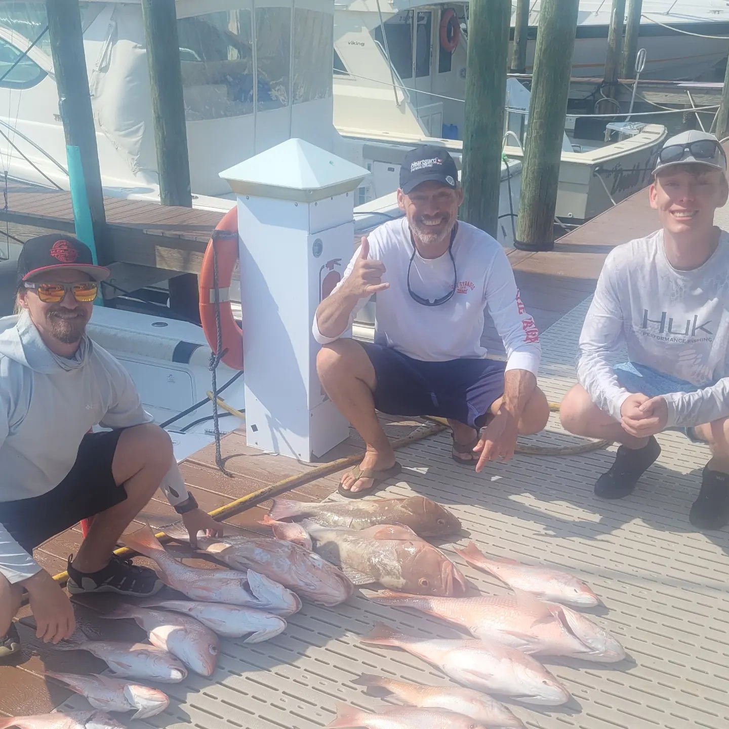 Three anglers enjoying a fishing trip in FL