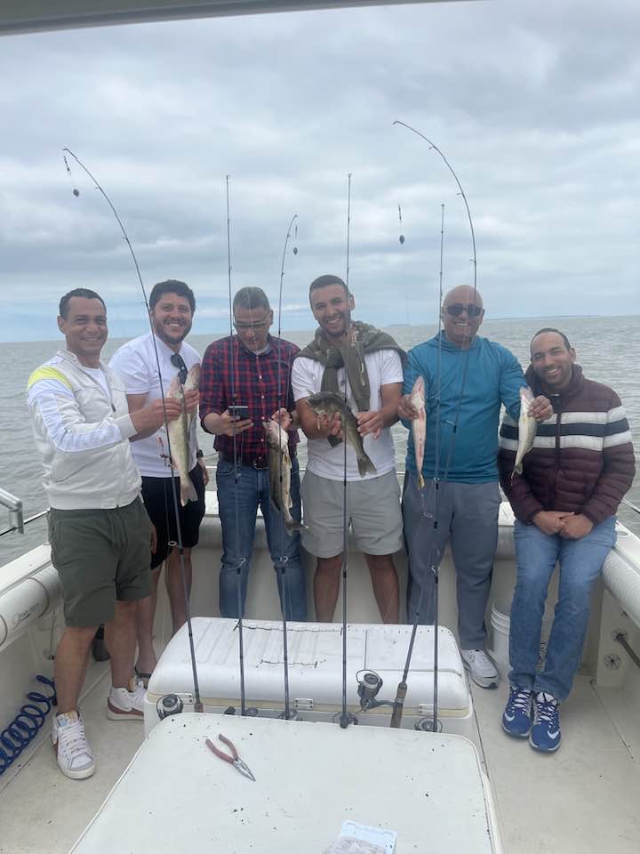 6 people fishing in Port Clinton