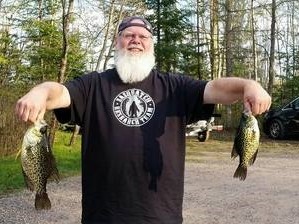 Two small fishing rods with a person casting in Wisconsin
