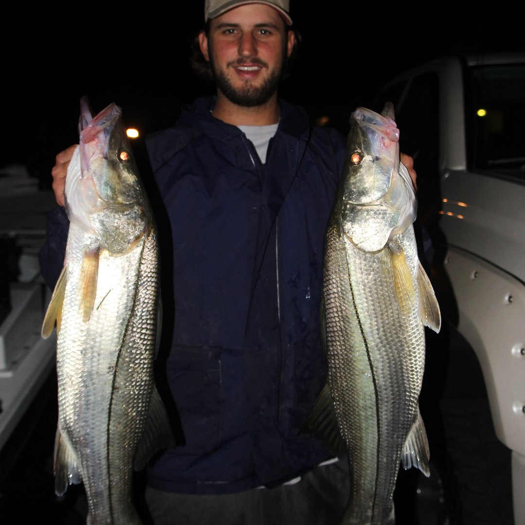 Two massive Snook caught on a fishing trip in Merritt Island