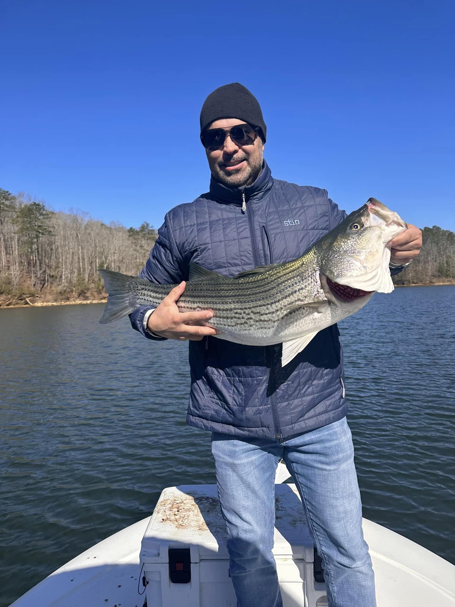 Angler fishing with rod and reel in Georgia