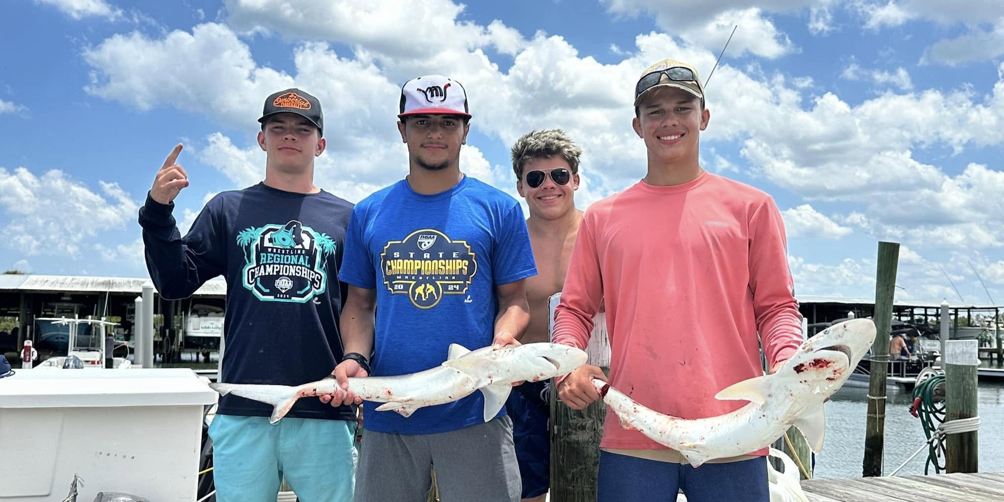 Ponce Inlet shark fishing charter boat with anglers catching sharks near Florida coast