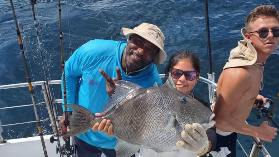 Catching a beautiful grey triggerfish in Orange Beach