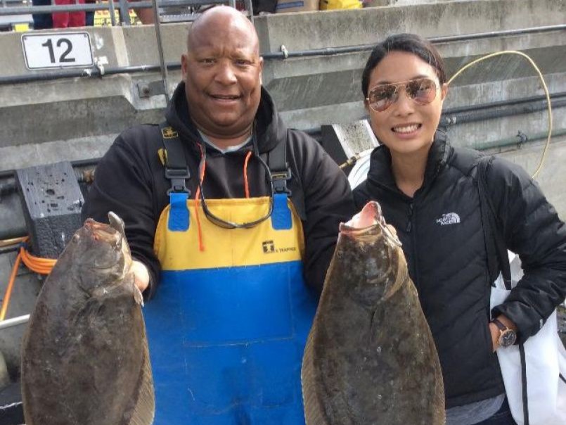 Two Pacific Halibut, 13 inches long, caught while fishing in San Francisco