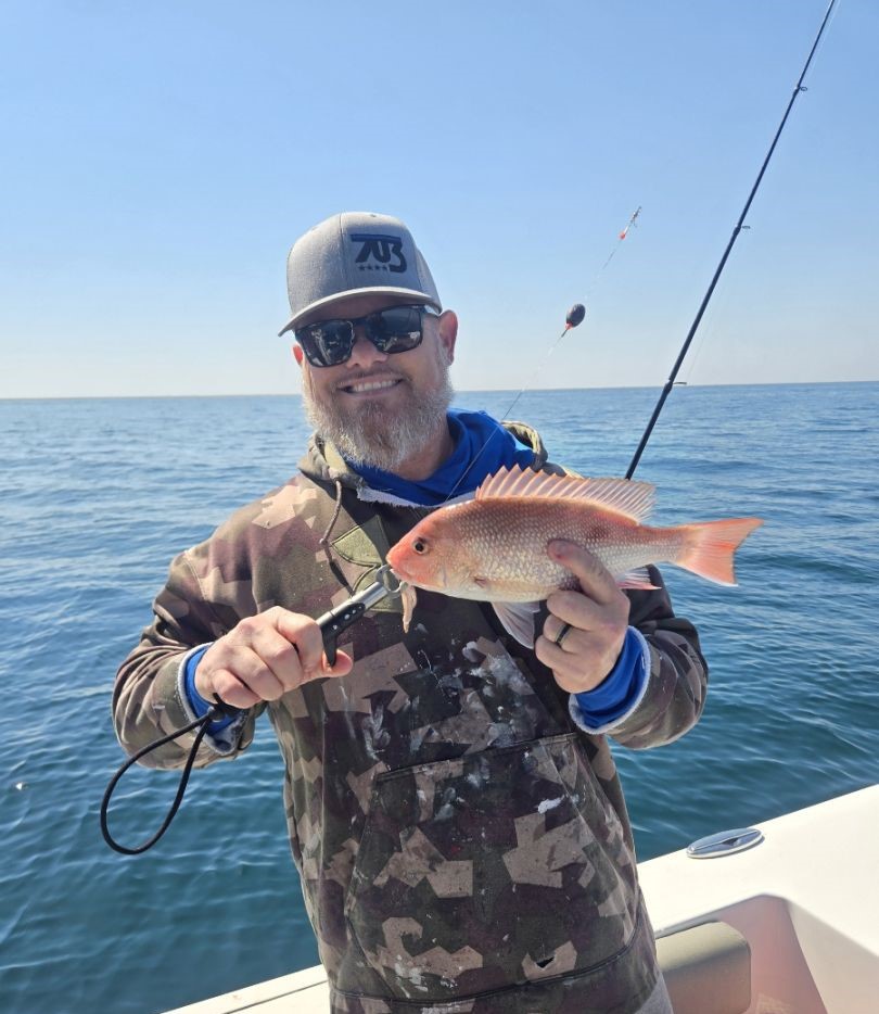 A single person fishing in Elberta