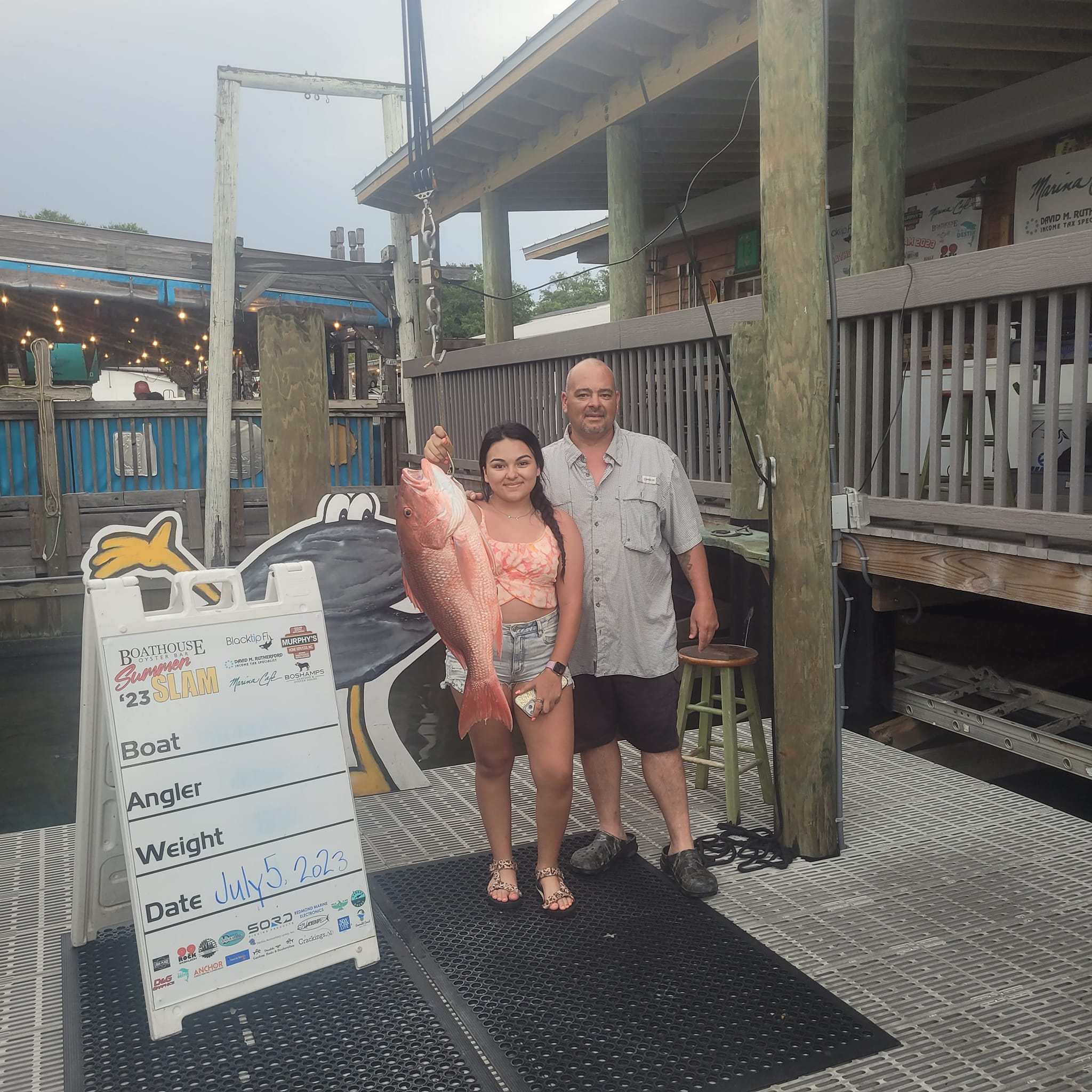 Two people fishing in Destin