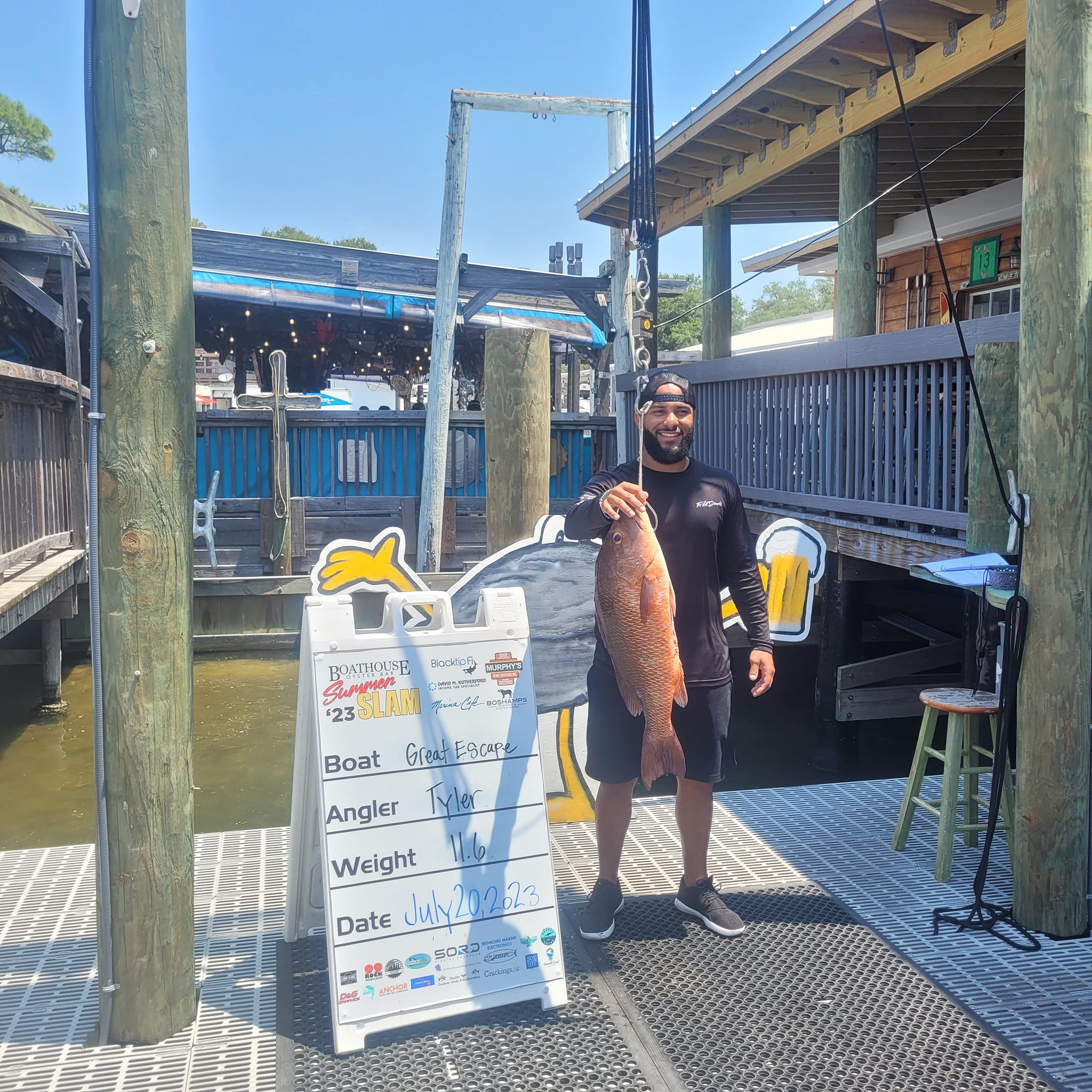 A grey snapper fish caught while fishing in Destin
