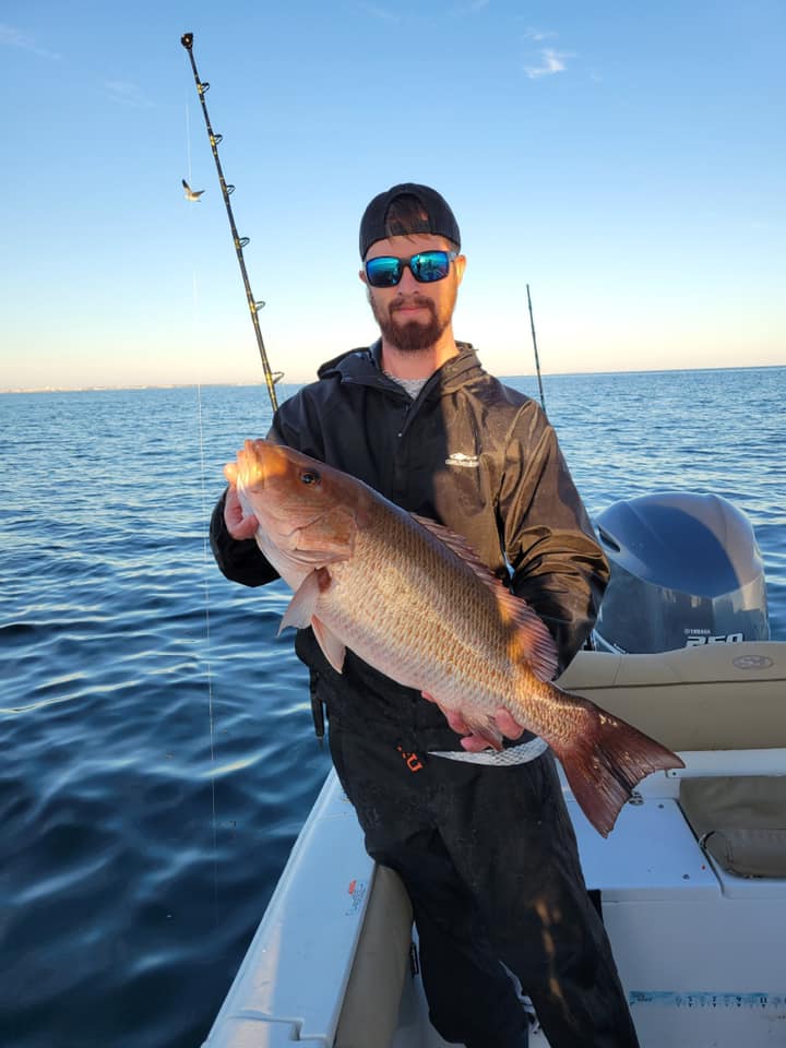 A person fishing with a rod in Florida